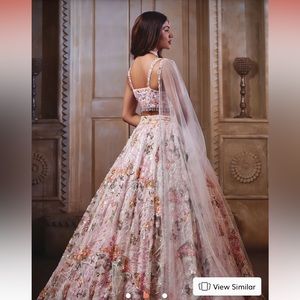 Pink flared bridal designer lehenga with all-over heavy floral embroidery